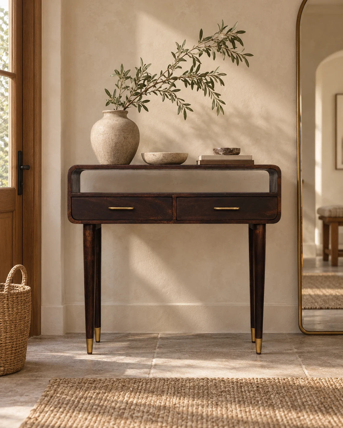 Dark wood console in a welcoming entryway